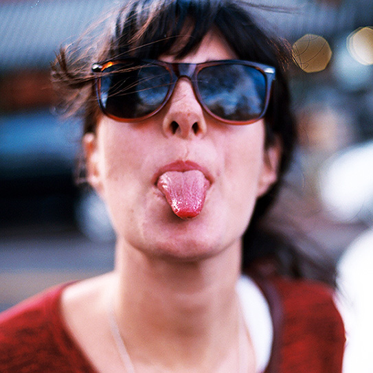 woman sticking tongue out