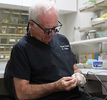 Dr. Gordon working on a dental crown.