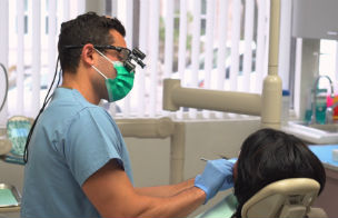 dentist providing cosmetic work to patient